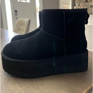 Almost brand new platform uggs. Only worn twice. Nothing wrong with them.